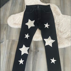 Vintage Levi’s women’s jeans size 26 Black with silver stars in front